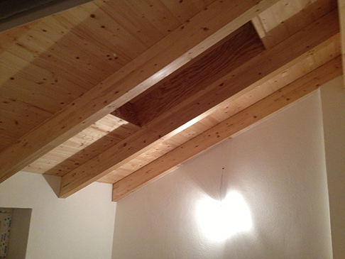 Recupero sottotetto con tetto a vista abitato